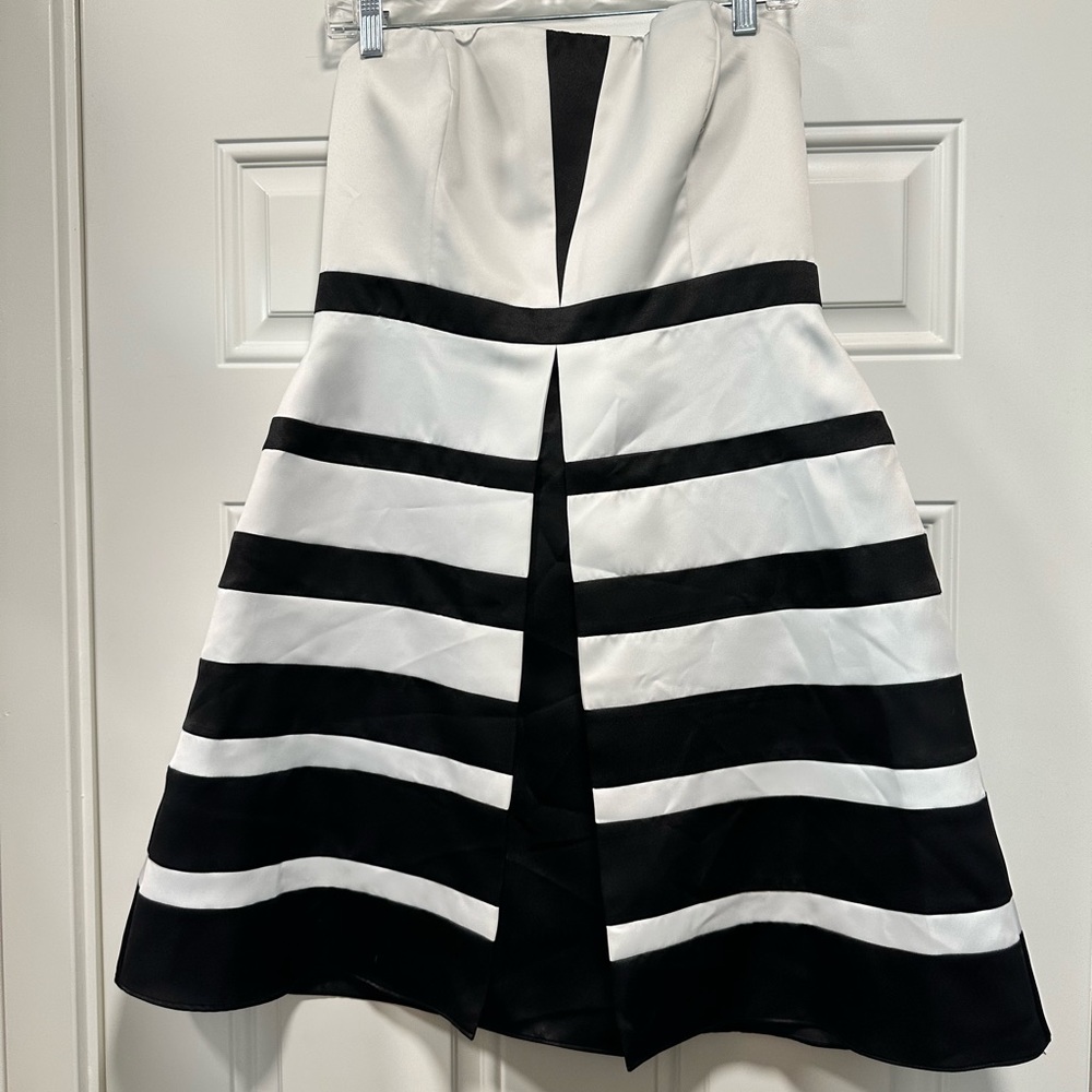 Max and Cleo size 12. Very fun strapless cocktail dress!